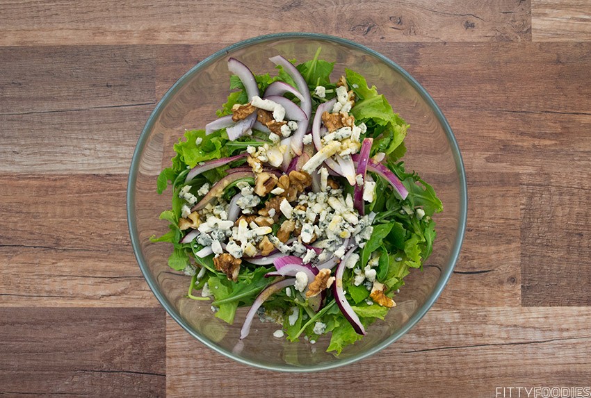 [picture of leafy green salad with blue cheese & walnuts]