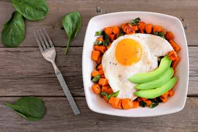 Breakfast bowl with eggs and sweet potato